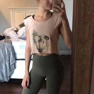 peach colored muscle t-shirt with skull design